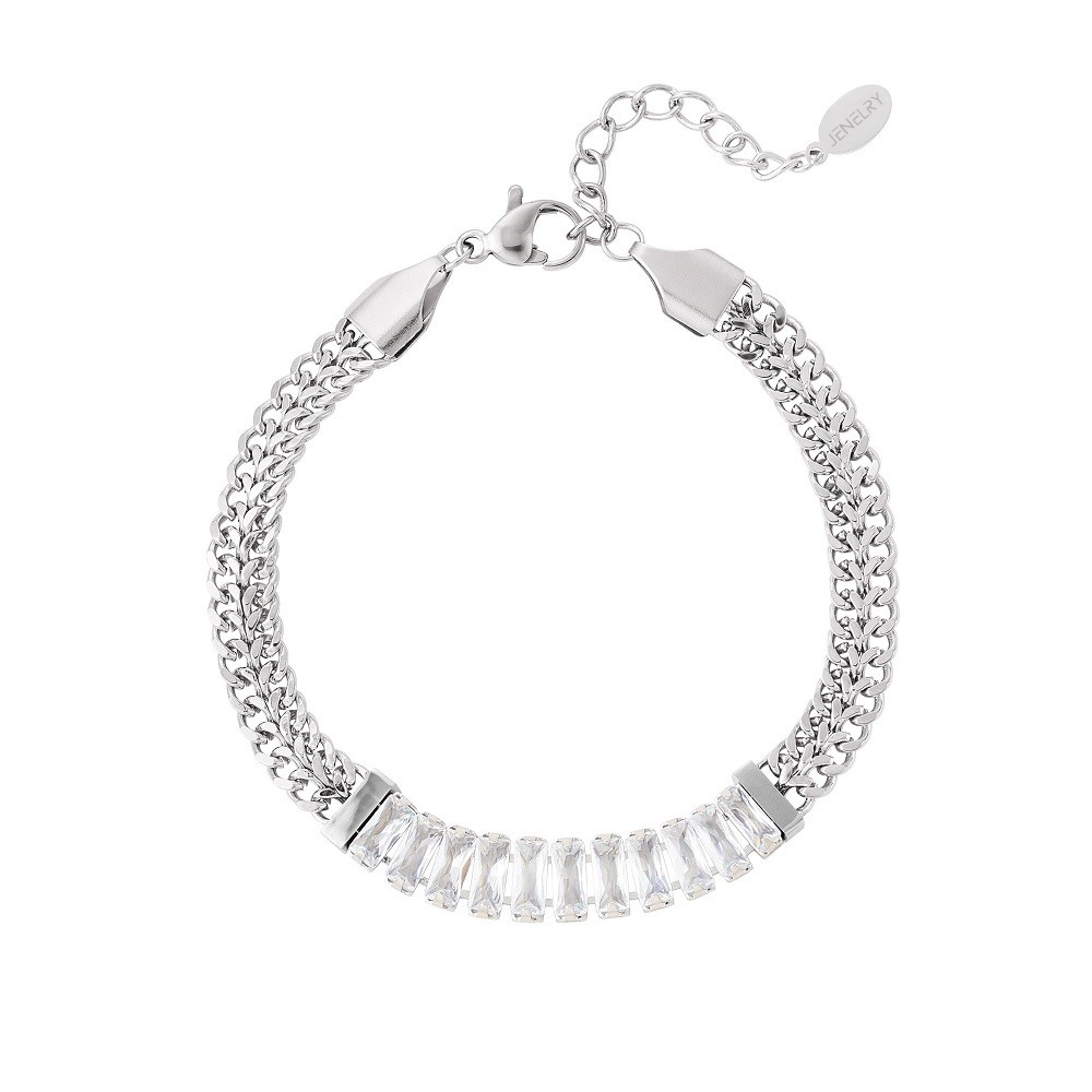 Waterproof Armband Cleopatra Zilver. Deze armband heeft een fijne schakel en kleurrijke strass steentjes in het midden van de schakelarmband. De strass steentjes hebben verschillende kleuren. De armband is erg opvallend en feestelijk. De armband is waterproof en verkleurt niet als deze in aanraking komt met water. Het armbandje is te bestellen op www.jenelry.com