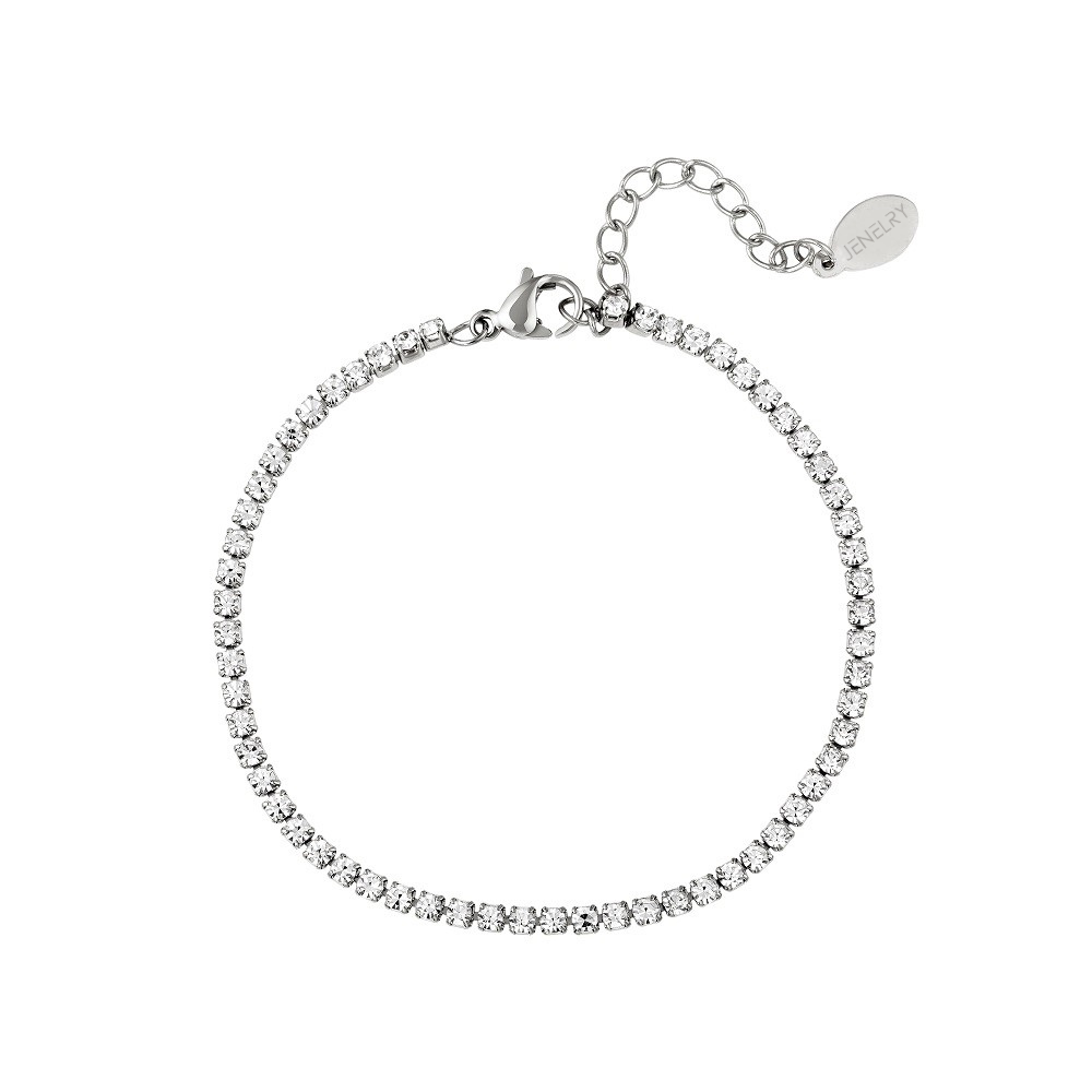 Waterproof Armband Sparkle Zilver. Deze armband bestaat uit een schakel van strass steentjes en is perfect voor de feestdagen of voor feestjes. Een leuk cadeauidee. De armband is gemaakt van stainless steel, hierdoor verkleurt de armband niet en blijft hij mooi. De armband is te bestellen op www.jenelry.com