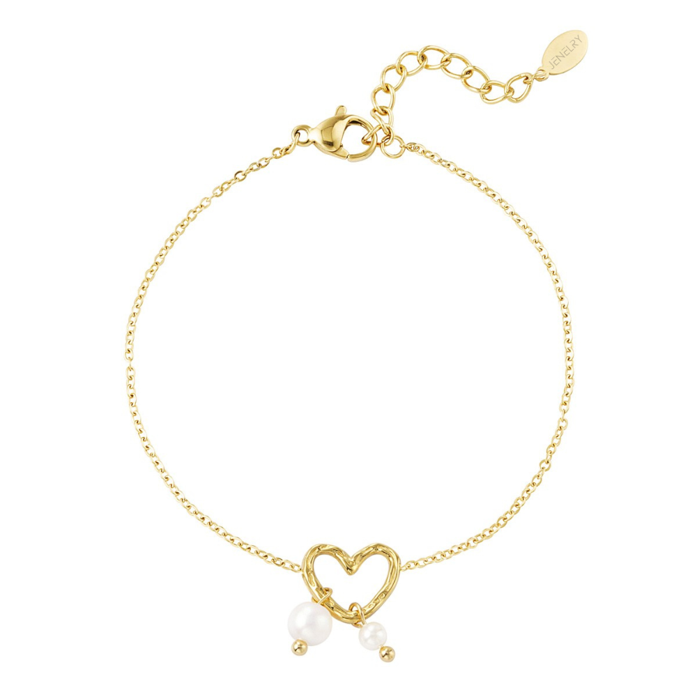 Subtiel armbandje Lovely Pearls heeft een hele fijne schakel, een hartje en twee kleine pareltjes als bedels. De armband is gemaakt van stainless steel, hierdoor is de armband waterproof, nikkelvrij en hypoallergeen. De armband kun je bestellen op www.jenelry.com