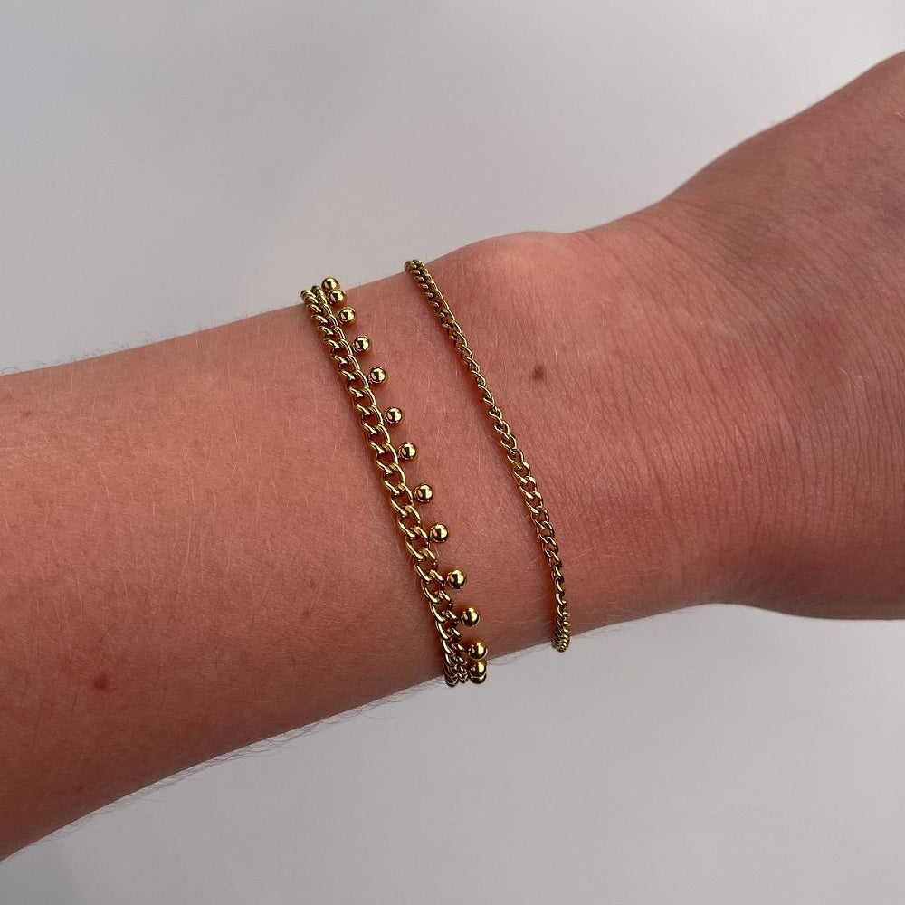 Waterproof gouden armband Dancing Dots, subtiele armband in het goud, gemaakt van stainless steel. De armband is waterproof en verkleurt niet.